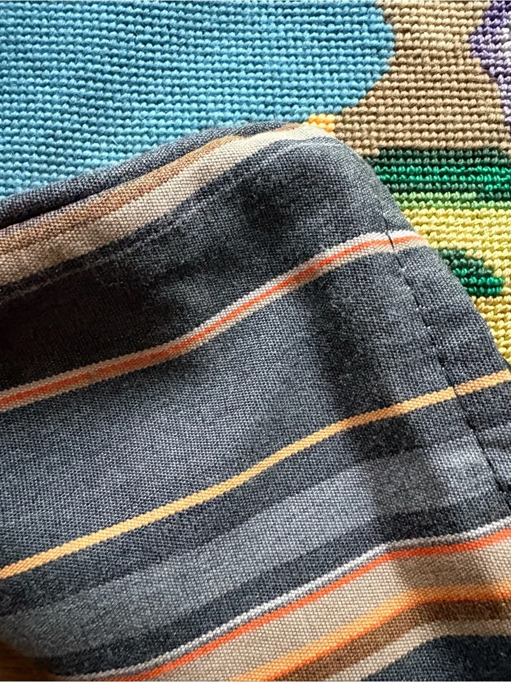Custom Needlepoint pillow covers with cording, zippers & striped fabric backing